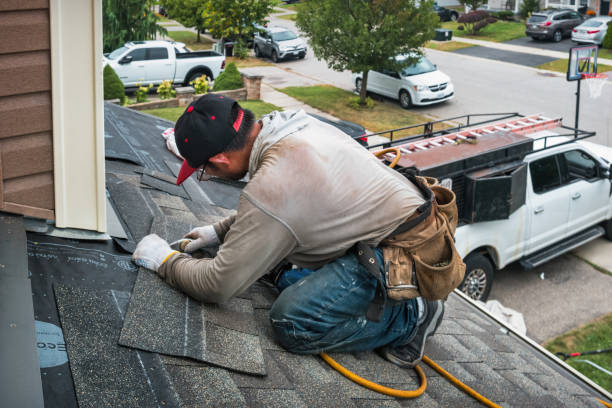 Professional Roofing technician working in Asheville, NC